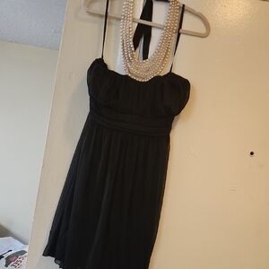 Elegant Black Strapless Dress with Pearl Neckline